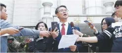  ??  ?? SEOUL: Attorney Peter Young-Yeel Ko speaks in front of the Seoul Central District Court. — AP