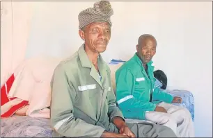  ?? Picture: LULAMILE FENI ?? SHOCKED: Villagers in Nkalane in Qunu are outraged after Nodambile Nomhlophe Zinele was found dead with multiple stab wounds to her upper body. Family spokesman and her nephew Vuyisile Ngqalo, left, and community leader Mlandeli Nxalo address the media...