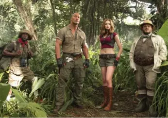  ?? FRANK MASI/SONY PICTURES ?? The Kevin Hart, left, and Dwayne Johnson-led Jumanji earned an additional $36 million (U.S.) this weekend.
