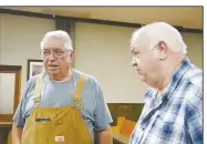  ?? (NWA Democrat-Gazette/Thomas Saccente) ?? david bowles (left), Franklin County justice of the peace, speaks with Rickey Denton after a Franklin County Quorum Court meeting in Charleston. Denton was appointed sheriff last week after the removal of former sheriff Anthony Boen.