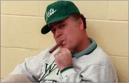  ?? W. FUNCHES THE ASSOCIATED PRESS ?? FILE - in this Dec. 31, 1986 file photo, New York Jets coach Joe Walton smokes a cigar during an interview at Hofstra University in West Hempstead, N.Y.