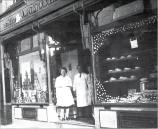  ??  ?? A splendid picture showing the Alfred Joint Stock Bakery shop in North Street which shows staff; Dolly Butler, Charlie Macdonald and Betty Woodcock (latterly Kennett)