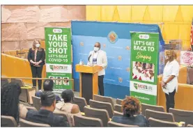  ?? Rachel Aston Las Vegas Review-journal @rookie__rae ?? Dr. Fermin Leguen, district health officer for the Southern Nevada Health District, speaks at the launch of a campaign called “Back to Life” intended to fix the disparity in the number of Black residents in Clark County who have received COVID-19 vaccinatio­ns. It was held Monday in the Clark County Commission chambers.