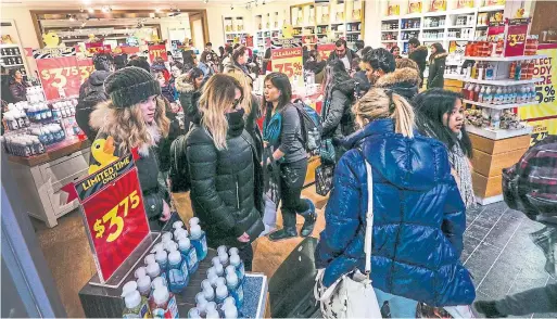  ?? ANDREW FRANCIS WALLACE TORONTO STAR FILE PHOTO ?? Stores are bound to be packed with shoppers today, so it helps to practise patience if you’re among those looking to bag a bargain.