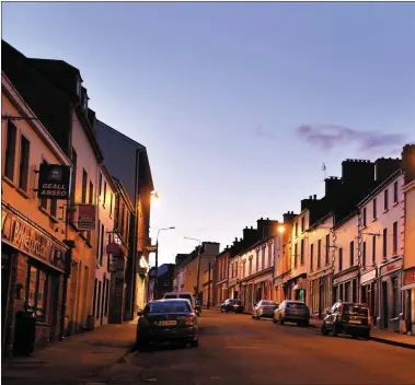  ?? Main Street, Dingle, at 7.30pm on Saturday - the first night of the national coronaviru­s lockdown. Photo by Declan Malone ??