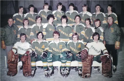  ?? CHAD HIPOLITO / POSTMEDIA NEWS FILES ?? The 1972 Humboldt Broncos team photo shows Dr. Terry Henning, left, as head coach. He was given the job after the team’s first coach celebrated wins with a little too much gusto.