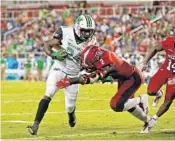  ?? JOEL AUERBACH/GETTY IMAGES ?? Azeez Al-Shaair, right, said immediatel­y after the victory the Shula Bowl this past weekend that Charlotte, FAU’s next opponent, was on the clock. in