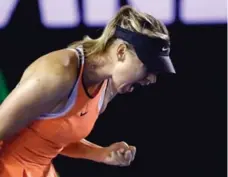  ?? AARON FAVILA/THE ASSOCIATED PRESS ?? Maria Sharapova of Russia reacts after winning a point against Belinda Bencic during fourth-round play at the Australian Open on Sunday.