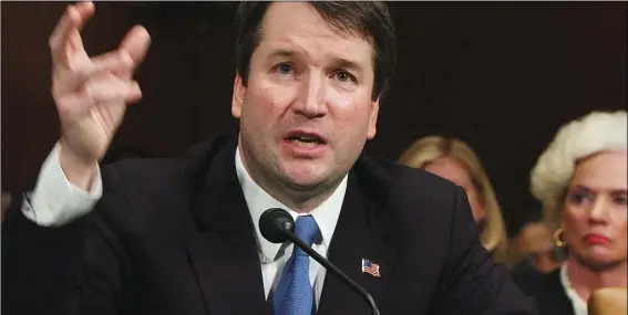  ??  ?? In this April 26, 2004, file photo, Brett Kavanaugh appears before the Senate Judiciary Committee on Capitol Hill in Washington. Kavanaugh is on President Donald Trump’s list of potential Supreme Court Justice candidates to fill the spot vacated by...