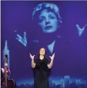  ??  ?? Anne Carrère sings the songs of Edith Piaf, with projection­s bringing to life the French icon’s era.