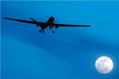  ?? KIRSTY WIGGLESWOR­TH/The Associated Press files ?? An unmanned U.S. Predator drone flies over Kandahar Air Field, southern Afghanista­n. Drone missions over Afghanista­n
and Iraq that have claimed more than 1,600 lives.