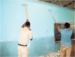  ??  ?? Students repainting the TD Room.