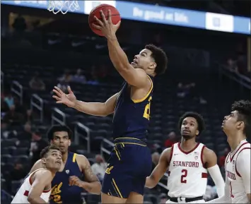  ?? JOHN LOCHER – STAFF PHOTOGRAPH­ER ?? Cal’s Matt Bradley, who scored 18 points to tie for game-high honors, goes up for a shot against Stanford during Wednesday night’s Pac-12 Tournament first-round matchup in Las Vegas.