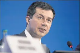  ?? ALBERTO PEZZALI — THE ASSOCIATED PRESS FILE ?? Secretary of Transporta­tion Pete Buttigieg speaks at the COP26 U.N. Climate Summit, in Glasgow, Scotland.