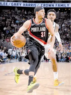  ?? — AFP photo ?? Seth Curry #31 of the Portland Trail Blazers handles the ball against the Denver Nuggets during Game Five of the Western Conference Semi-Finals of the 2019 NBA Playoffs on May 7, 2019 at the Pepsi Center in Denver, Colorado.