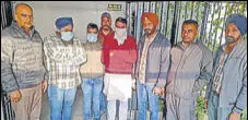  ?? HT PHOTO ?? The accused in vigilance bureau’s custody in Jalandhar on Sunday.