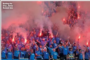  ?? ?? Battling the drop…Hansa Rostock fans