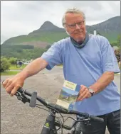  ?? Photograph: Iain Ferguson, alba. photos. ?? David Cooper prepares to set off on his electric mountain bike.