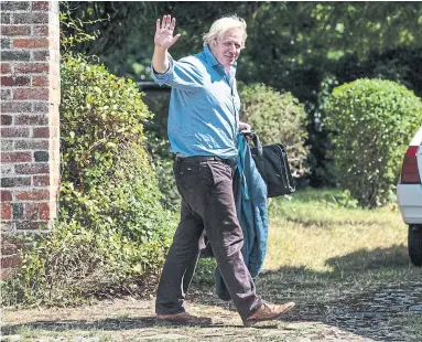  ?? JACK TAYLOR/GETTY IMAGES ?? Former British foreign secretary Boris Johnson shows the power of charm, writes Heather Mallick.