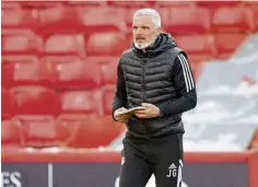  ?? ?? Dons boss Jim Goodwin has been feeling the pressure.