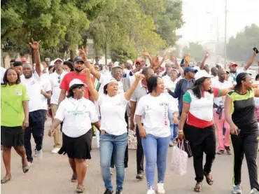  ?? PHOTO: NAN ?? Members of Coalition of Like-Minds, Atiku Support Groups during Road Walk in Abuja on Friday.