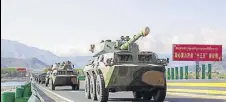  ?? HT FILE ?? Chinese armoured vehicles in a military drill in Tibet. Experts said the 25metre wide highway can be used by armoured vehicles and serve as a runway for military aircraft.