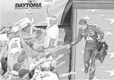  ?? REINHOLD MATAY, USA TODAY SPORTS ?? In his final Daytona Internatio­nal Speedway race, Jeff Gordon finished sixth early Monday and witnessed a fiery crash.