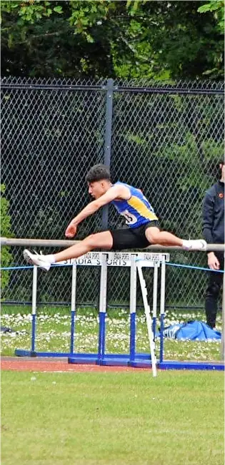  ?? ?? Jake Cover in hurdles action