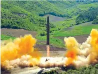  ?? KOREAN CENTRAL NEWS AGENCY / KOREA NEWS SERVICE VIA AP ?? This photo, distribute­d by the North Korean government, shows what was said to be the launch of a Hwasong-14 interconti­nental ballistic missile in North Korea’s northwest Tuesday.