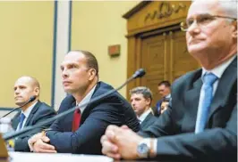  ?? NATHAN HOWARD AP ?? Retired Air Force Maj. David Grusch (center) and retired Navy Cmdr. David Fravor (right) testify before a House hearing on UFOs on Wednesday.