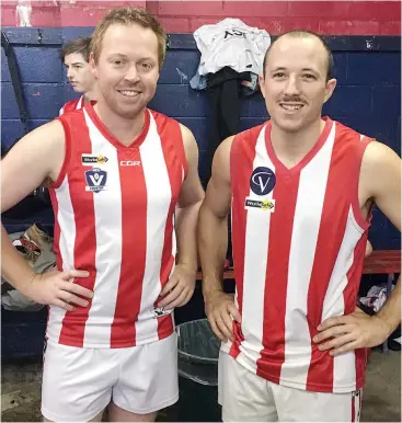  ??  ?? Romain Georges (right) and Trafalgar reserves coach Brett Tonkin celebrate in the red and white jersey. Photograph: Michael Robinson.