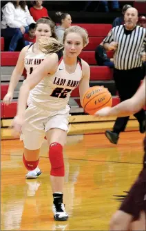  ?? TIMES photograph by Annette Beard ?? Junior Lady Blackhawk Blakelee Winn (No. 22) led the Hawks with 15 points followed by junior Aidan Dayberry (No. 5) with 10, senior Alissa Short (No. 23) with 7 and sophomore Lauren Wright (No. 12) with 2. See more photograph­s on page 2B.