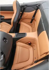  ??  ?? Top: One in three owners use the rear seat of their 2+2 Ferrari and thankfully rear legroom is up by 50mm. Facing page top: As with all Ferraris, steering wheel incorporat­es all the functions including the Manettino and wiper controls