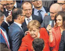  ?? FOTO: DPA ?? Die Abgeordnet­en bei der Abstimmung über den Bundeshaus­halt, unter ihnen Bundeskanz­lerin Angela Merkel (CDU).