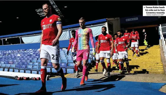  ?? Robbie Stephenson/JMP ?? > Tomas Kalas leads his side out to face Coventry recently