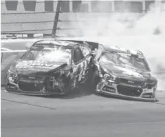  ?? LUKE BRODBECK, AP ?? Jeff Gordon, left, collides with Bobby Labonte en route to a 39thplace finish that dropped him to 16th in the standings.
