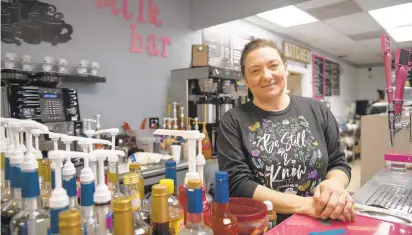  ?? HANNAH RUHOFF/STAFF ?? Mary Jane Hamblin, owner of Amazing Glazed doughnut shop in Chesapeake, poses for a portrait behind the counter at the store on Tuesday. The shop has been receiving threats since Hamblin’s husband, Ron, attended President Trump’s speech in Washington last Wednesday.