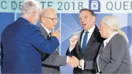  ?? RYAN REMIORZ/THE CANADIAN PRESS ?? From left, Liberal Leader Philippe Couillard, PQ Leader Jean-François Lisée, CAQ Leader François Legault and Québec solidaire co-spokespers­on Manon Massé before their English debate, an event that might set a precedent for future elections.