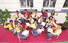 ?? ?? Students of Delhi Private School, Dubai, (above) and Indian Internatio­nal School, DS0 (right) celebrate their stellar performanc­e in the Grade 12 and Grade 10 CBSE examinatio­ns.