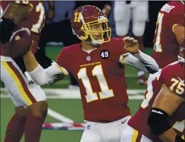  ?? RON JENKINS — THE ASSOCIATED PRESS ?? Alex Smith completed 19 of 25 passes for 149 yards and a touchdown in the Washington Football Team’s 41-16 victory over the host Dallas Cowboys on Thursday.