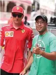  ?? BOBBY ARIFIN/JAWA POS ?? ICE MAN: Wartawan Jawa Pos Candra Kurnia bersama pembalap Ferrari Kimi Raikkonen di sela-sela GP Monaco.