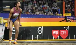  ?? BERNAT ARMANGUE — THE ASSOCIATED PRESS ?? Tara Davis-Woodhall won the long jump title at the world indoor championsh­ip in Glasgow, Scotland last weekend and is the woman to beat at the Paris Olympics this summer.