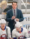  ?? Matt Freed/Associated Press ?? The Islanders fired head coach Lane Lambert, center top, on Saturday.