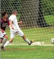  ?? For Montgomery Media / BOB KELLY ?? Lansdale Catholic’s Michael Lewis scores one of his four goals during Tuesday’s non-league game against Faith Christian.