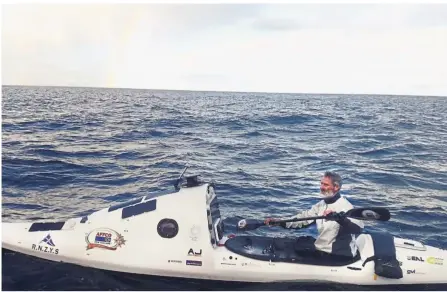  ?? — AP ?? Setting a record: Donaldson paddling his kayak in the Tasman Sea. He has become the first person to kayak solo across the Tasman Sea after a gruelling two-month voyage.