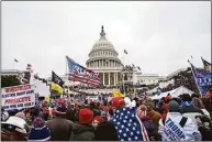  ?? Jose Luis Magana / Associated Press ?? Rioters loyal to President Donald Trump rally at the U.S. Capitol in Washington on Jan. 6, 2021.