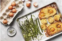  ?? FOOD STYLED BY MONICA PIERINI. CHRISTOPHE­R TESTANI/THE NEW YORK TIMES ?? Egg-in-a-hole with asparagus. Roasted asparagus and toasts dipped in a Parmesan-infused custard turn a childhood favorite into so much more.