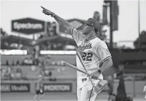  ?? MARK J. TERRILL/AP ?? Nationals outfielder Juan Soto celebrates Monday after winning the Home Run Derby in Los Angeles.