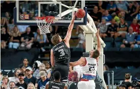  ?? GETTY IMAGES ?? Breakers forward Finn Delany blocks a shot from Adelaide’s Daniel Johnson in Auckland on Friday night.