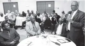  ??  ?? Reserve Bank deputy governor Dr Kupukile Mlambo addresses delegates at a breakfast meeting with the Botswana Chamber of Mines at a Bulawayo hotel yesterday. — Picture by Eliah Saushoma